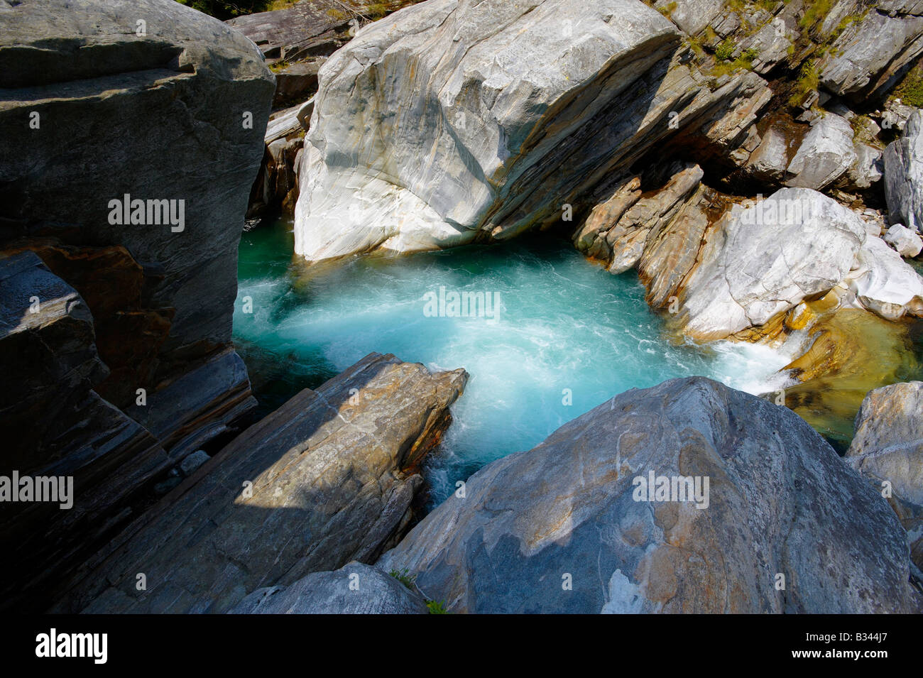 stones and river and waterfall in val verzasca , ticino , Stock Photo