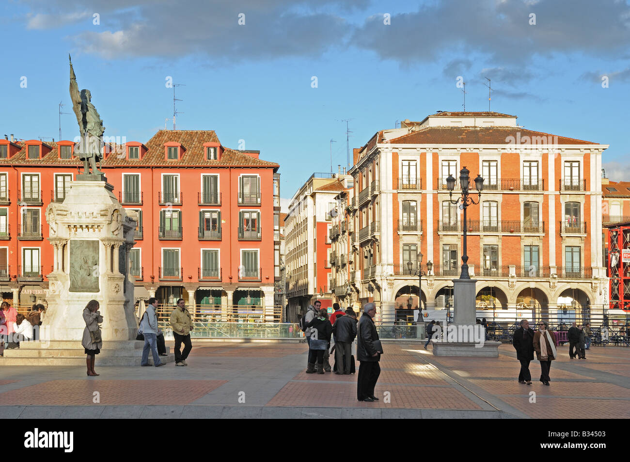 Statue of Count Ansúrez dominating the Plaza Mayor Valladolid Spain Pedestrians people enjoy the square Stock Photo