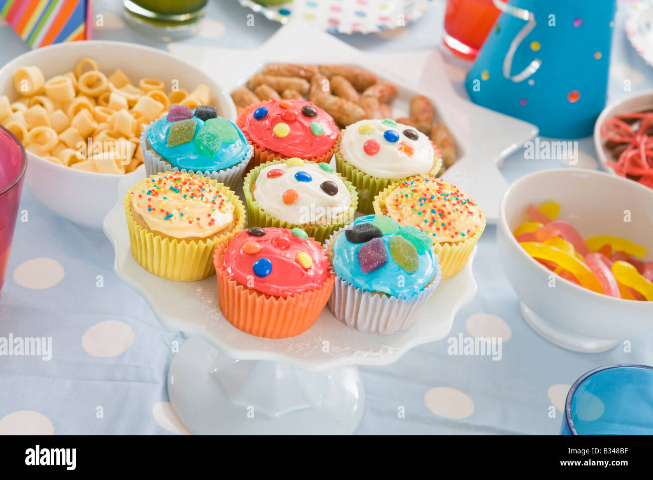 Birthday party table setting with food Stock Photo Alamy