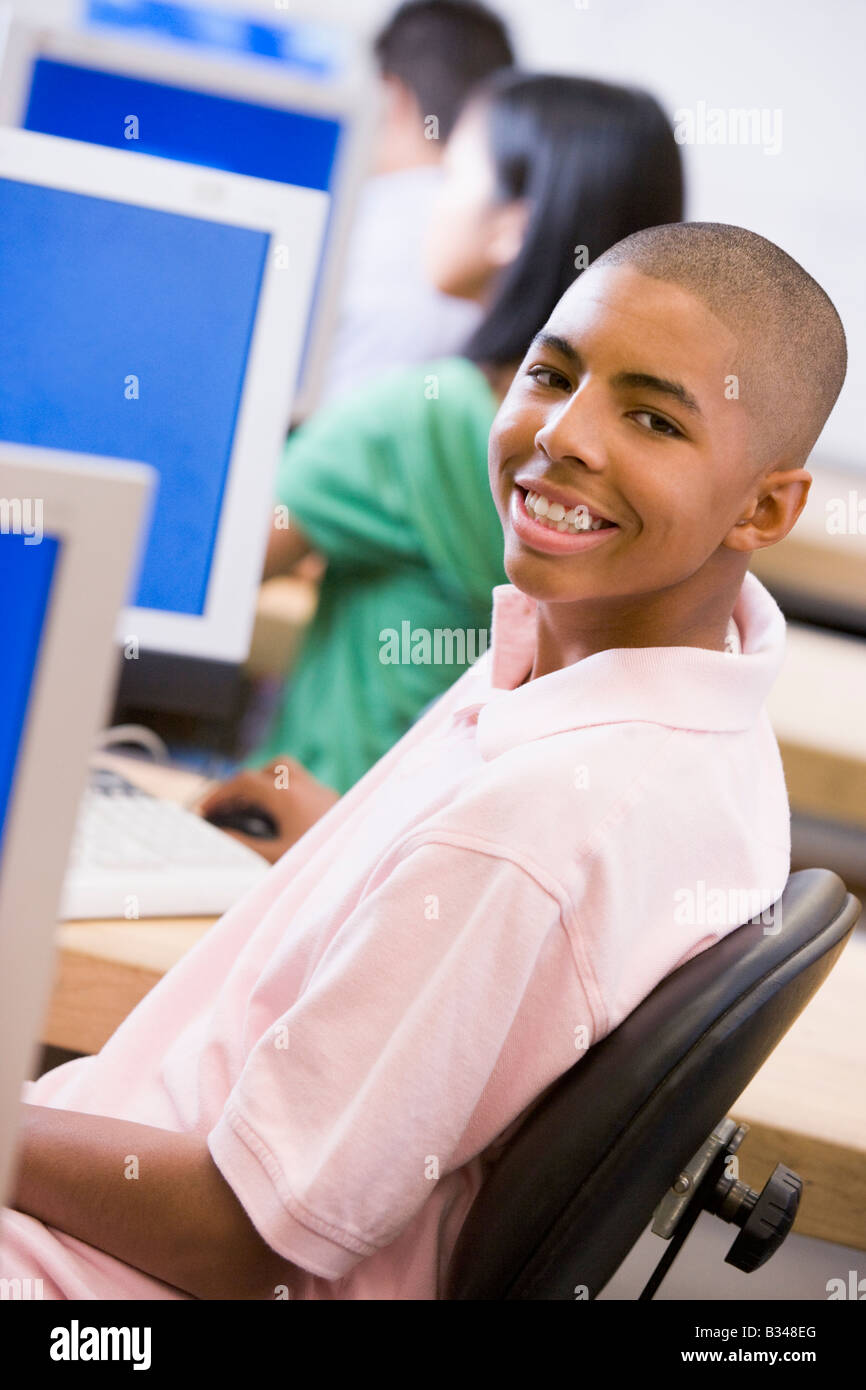Male student in computer class Stock Photo - Alamy