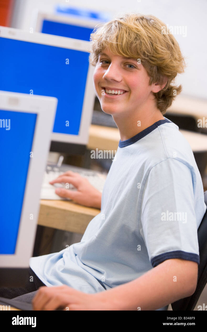 Male student in computer class Stock Photo - Alamy