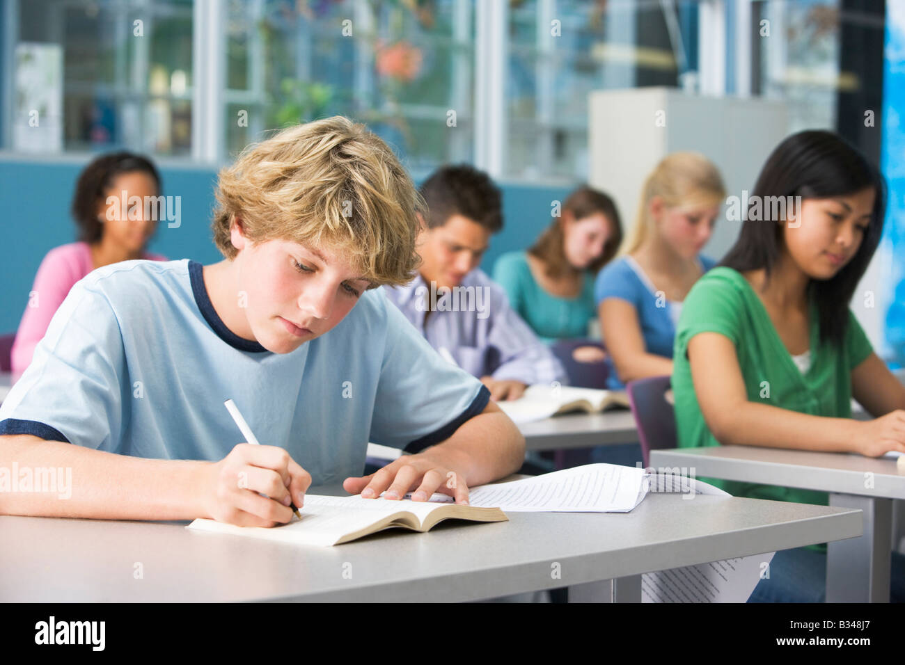 Students studying in geography class Stock Photo Alamy