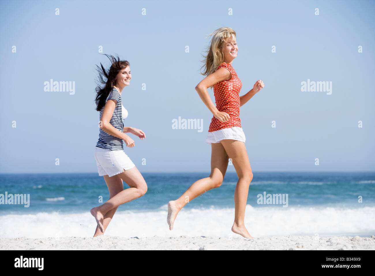 Woman jogging on beach fit hi-res stock photography and images - Alamy