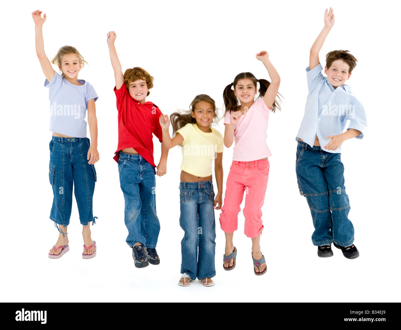 Group of five happy children jumping outdoors., Group of fi…