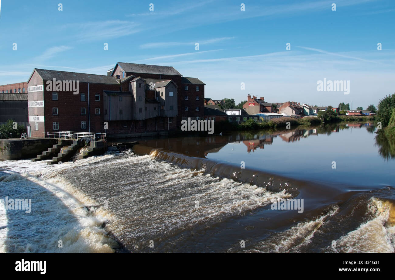 The weir and the flour mill seen from he new footbridge between Aire