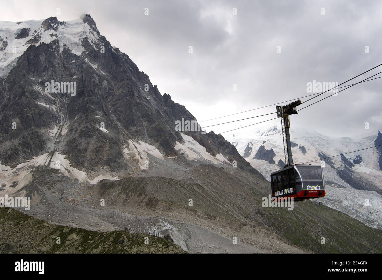 Aiguille Du Midi cable car, in bad weather, during th summer. Stock Photo