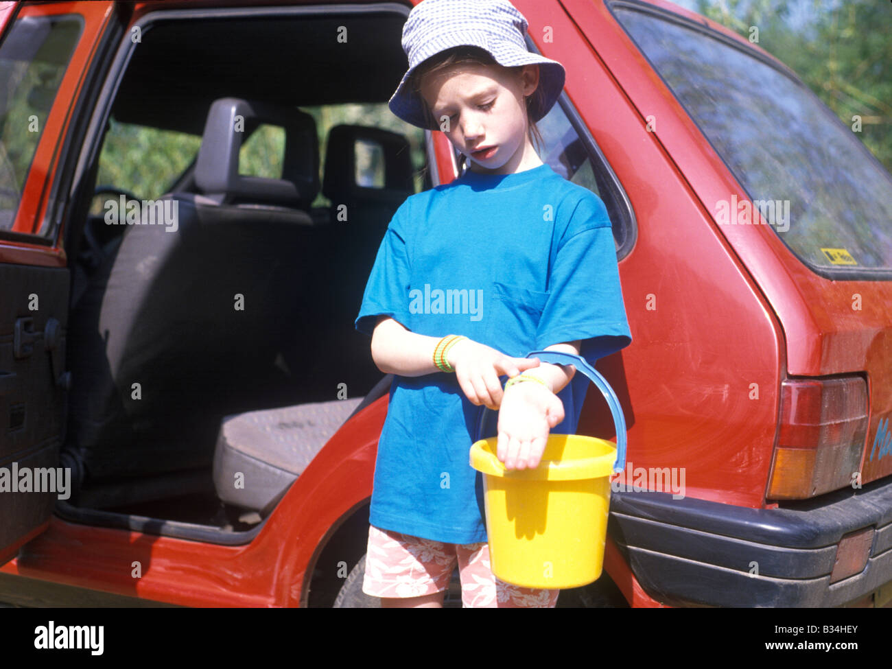 girl with travel bands for car sickness Stock Photo Alamy
