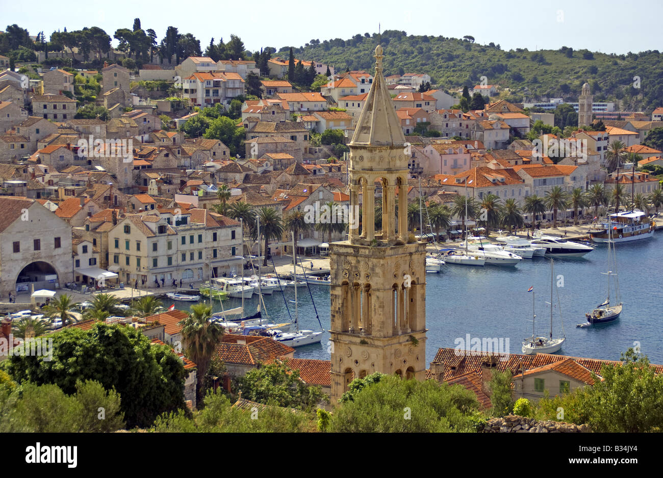 Hvar's medieval Venetian church bell tower, overlooking town's harbour waterfront, on island of Hvar in Adriatic Stock Photo