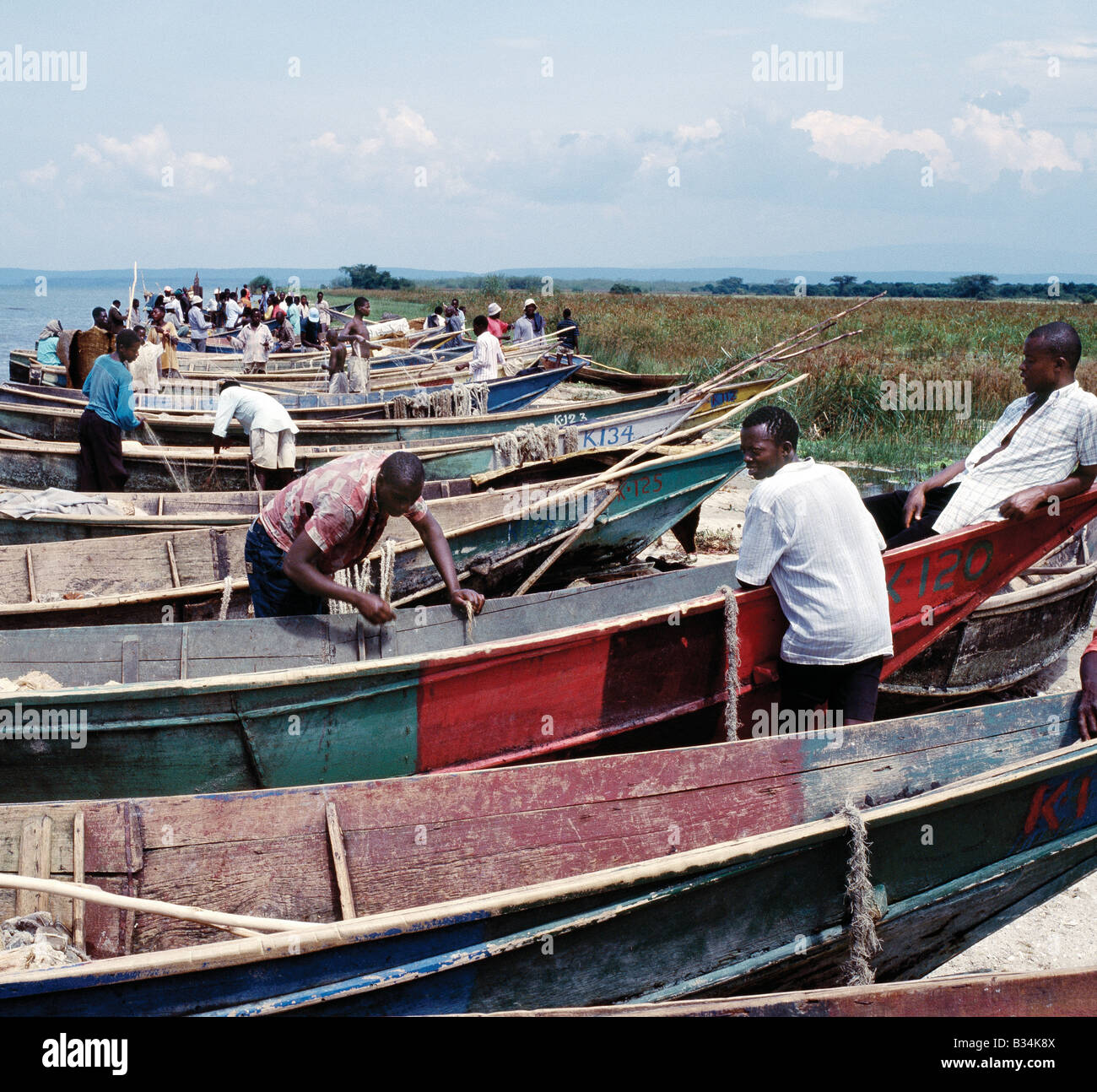 Uganda, Lake Edward, Rwenshama. Wooden fishing boats line the