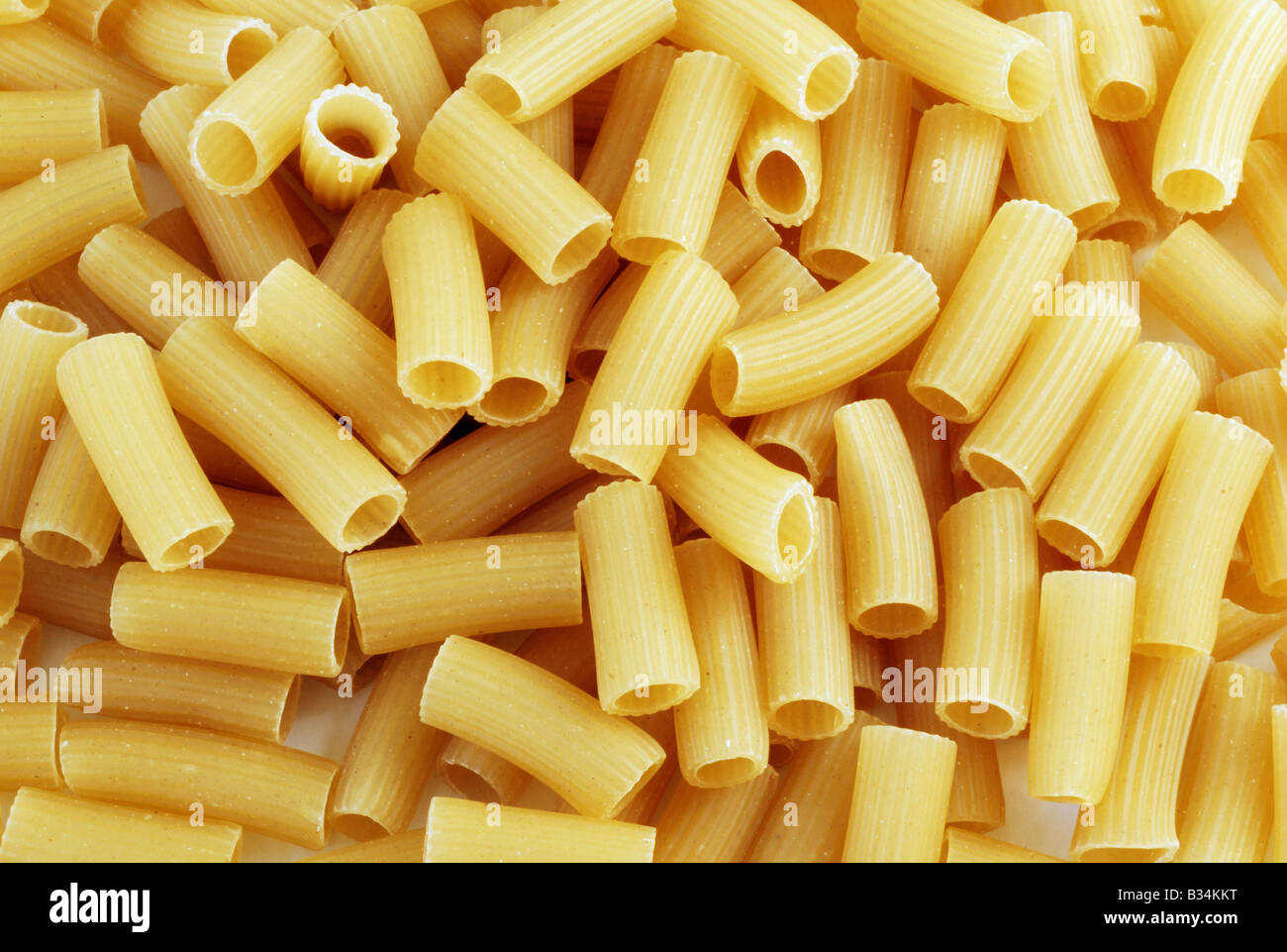 macaroni food closeup background in yellow color Stock Photo Alamy