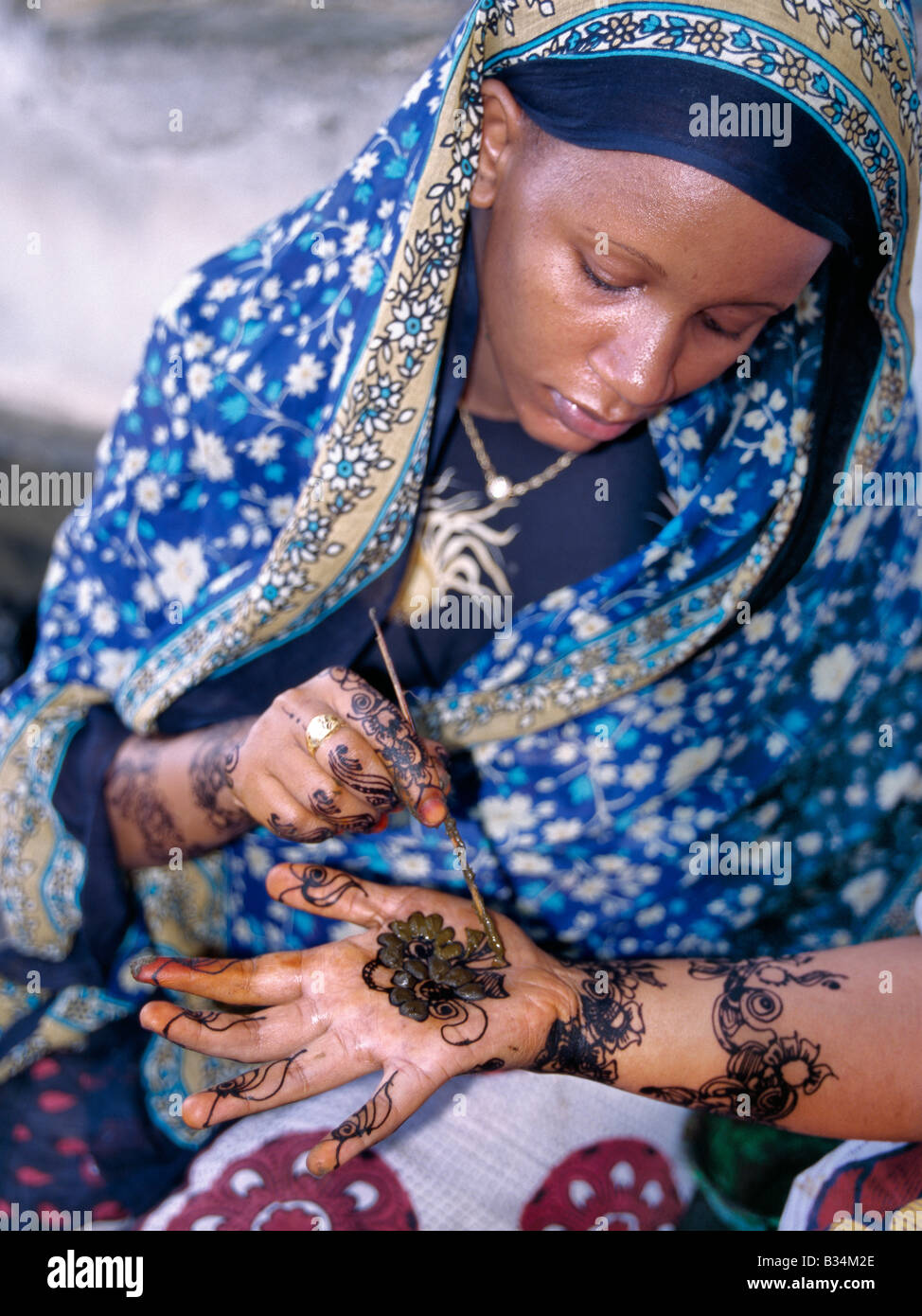 Kenya, Coast Province, Lamu Island. Lamu women are expert in intricate