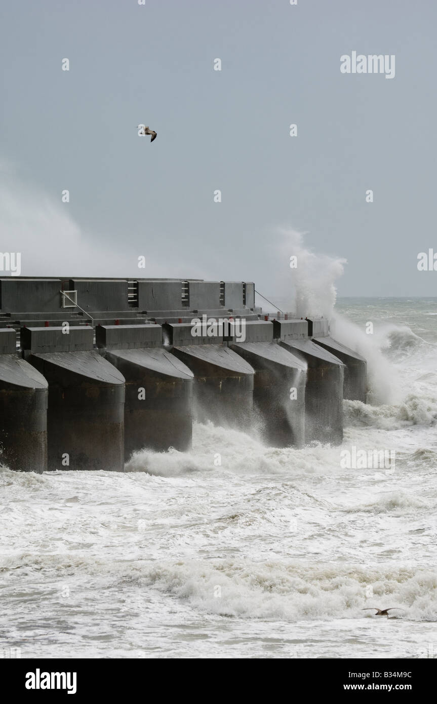 Brighton Marina's sea wall during a storm Stock Photo
