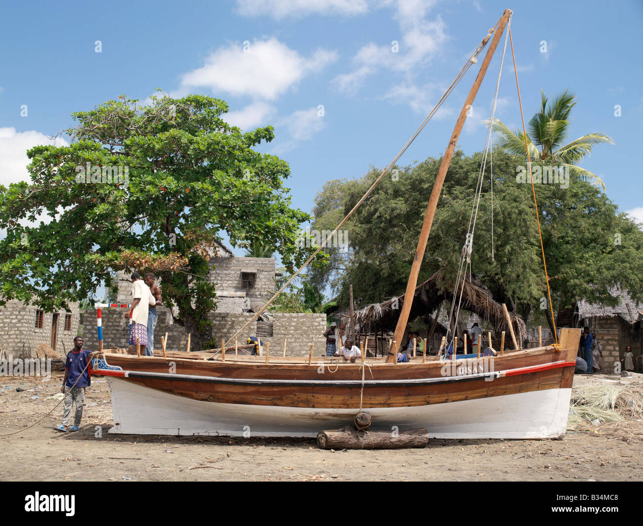 Kenya, Coast Province, Lamu Island. Boat builders put the 
