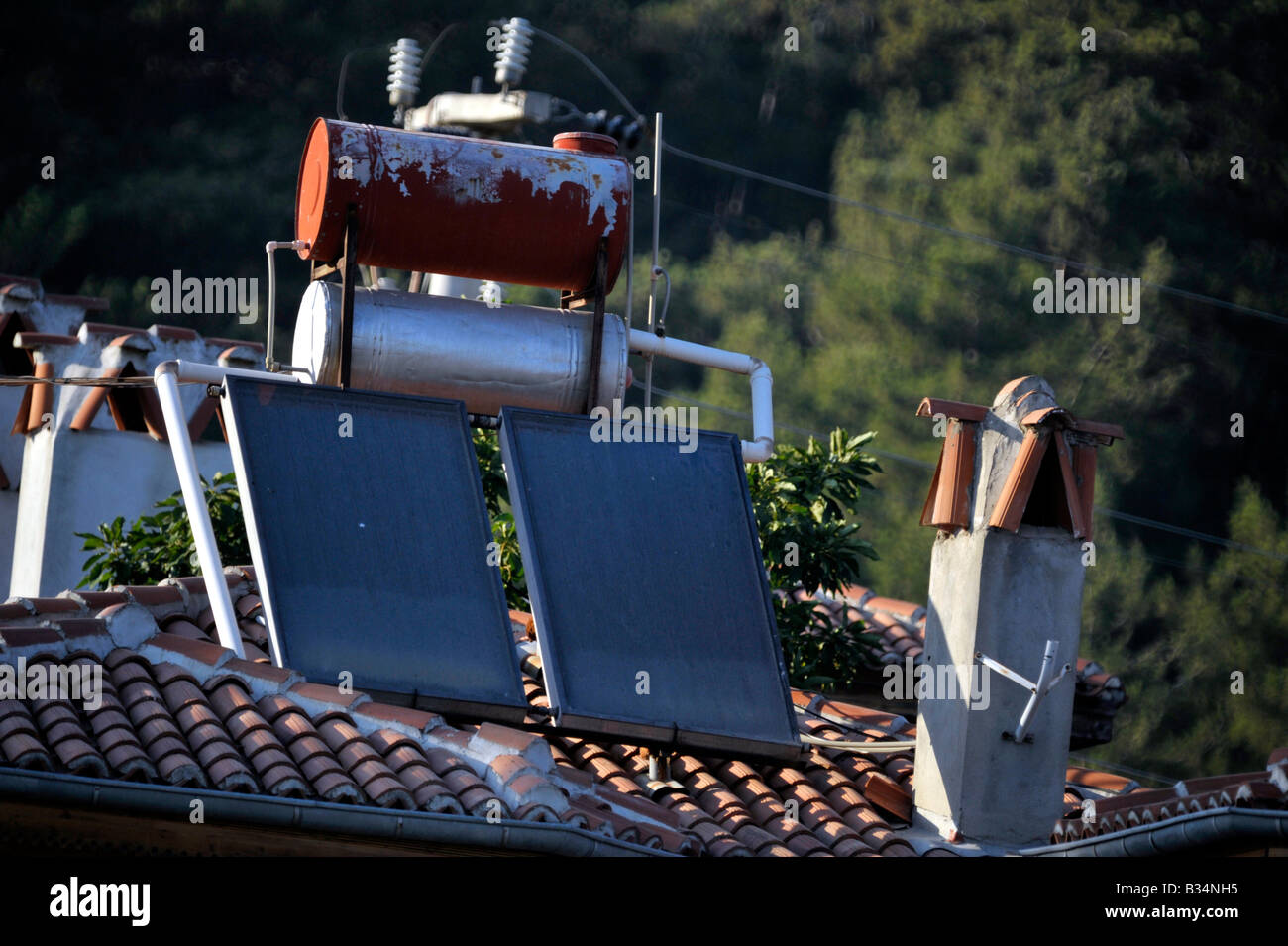 solar heating panels and water storage tank on Turkish house roof