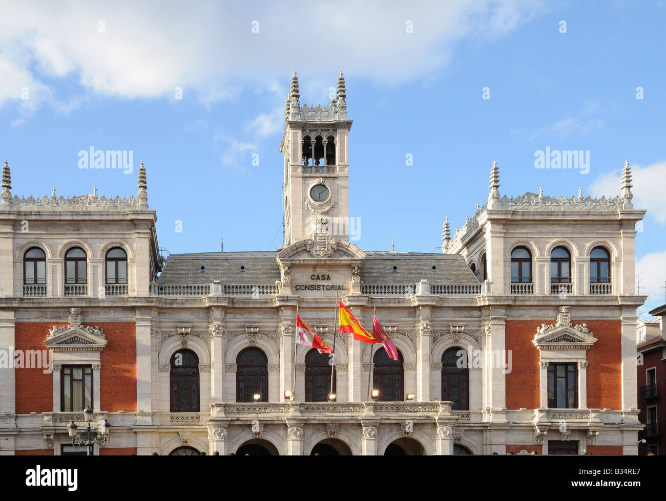 The facade and clock tower of the CASA CONSISTORIAL or Town Hall City Council building in the main square Valladolid Spain Stock Photo