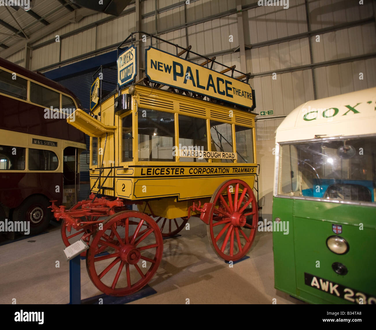 Vintage horse drawn yellow bus Transport display Snibston Discovery Park, Coalville, Leicester. Former colliery Leics GB UK muse Stock Photo