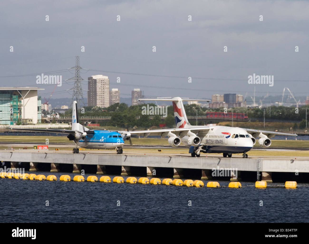 Two aircraft at London City Airport Stock Photo