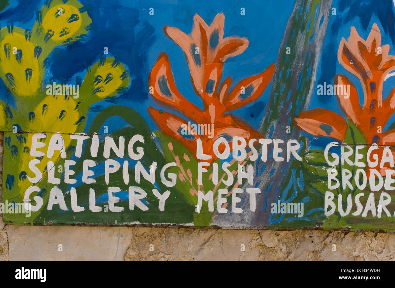 A painted mural advertising tourist facilities on Pakleni island Hvar Croatia Stock Photo