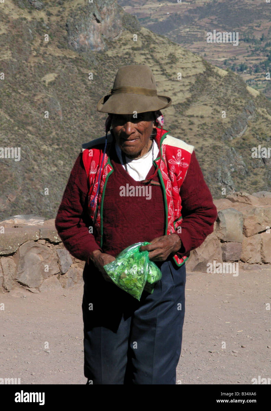 A man selling coca leaves Inca terraces at Pisac in the Sacred Valley