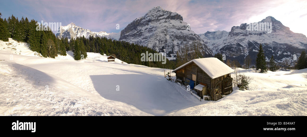 Mountain chalet in winter looking towards the Eiger mountain ...
