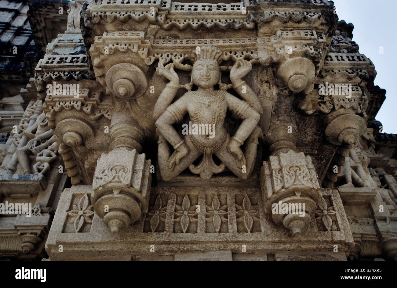 A CELESTIAL DEITY at a JAIN TEMPLE at RANAKPUR is carved out of white marble in the Pali District of RAJASTHAN near Sadri INDIA Stock Photo