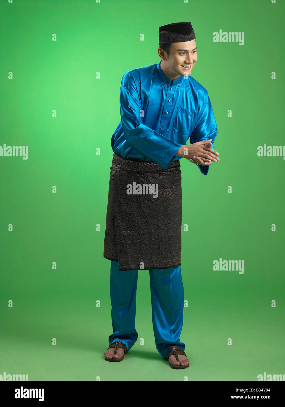 Malay man with traditional costume Stock Photo Alamy