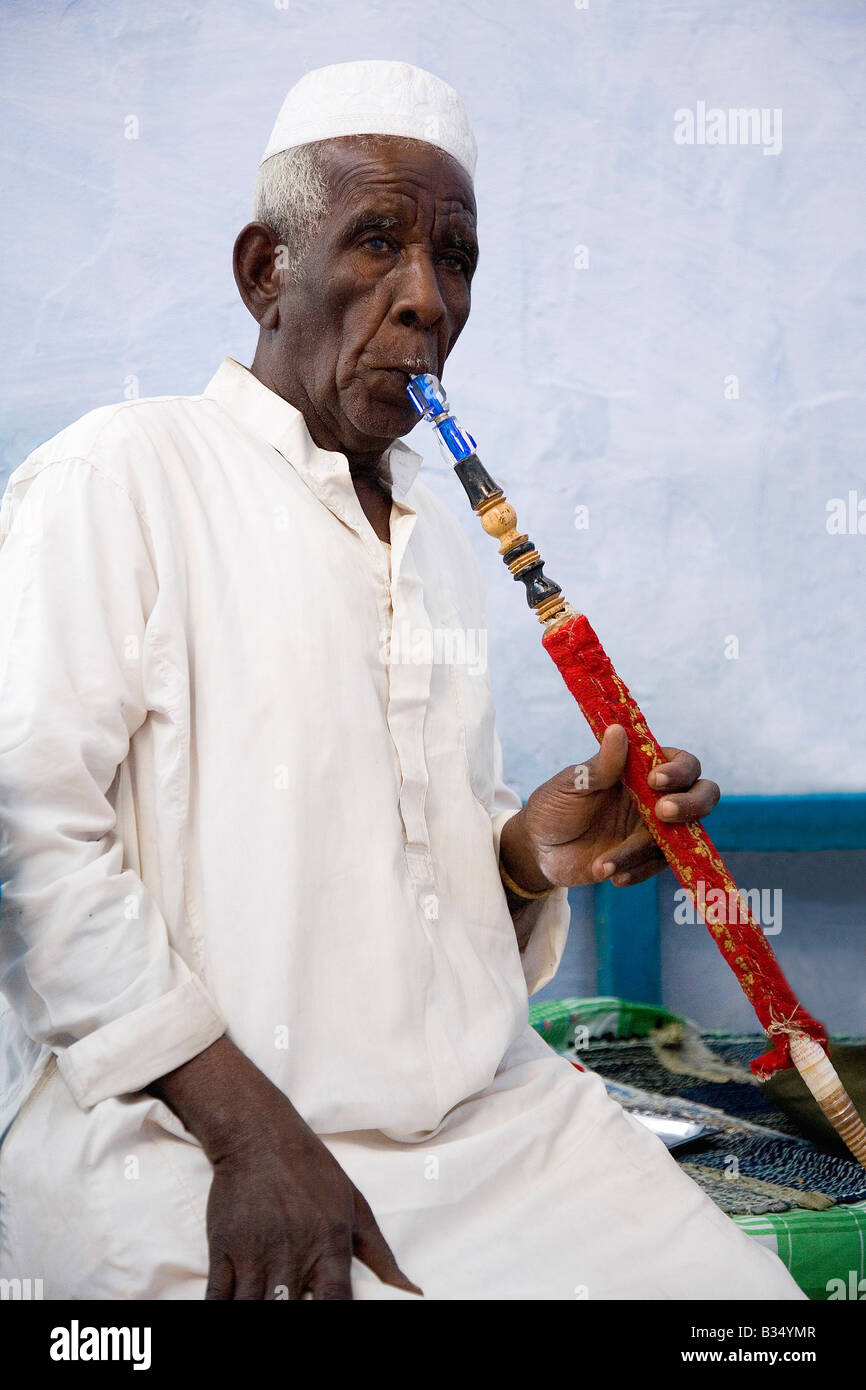 Old egyptian man smoking Hookah water pipe Nubia Aswan Egypt North Africa Stock Photo