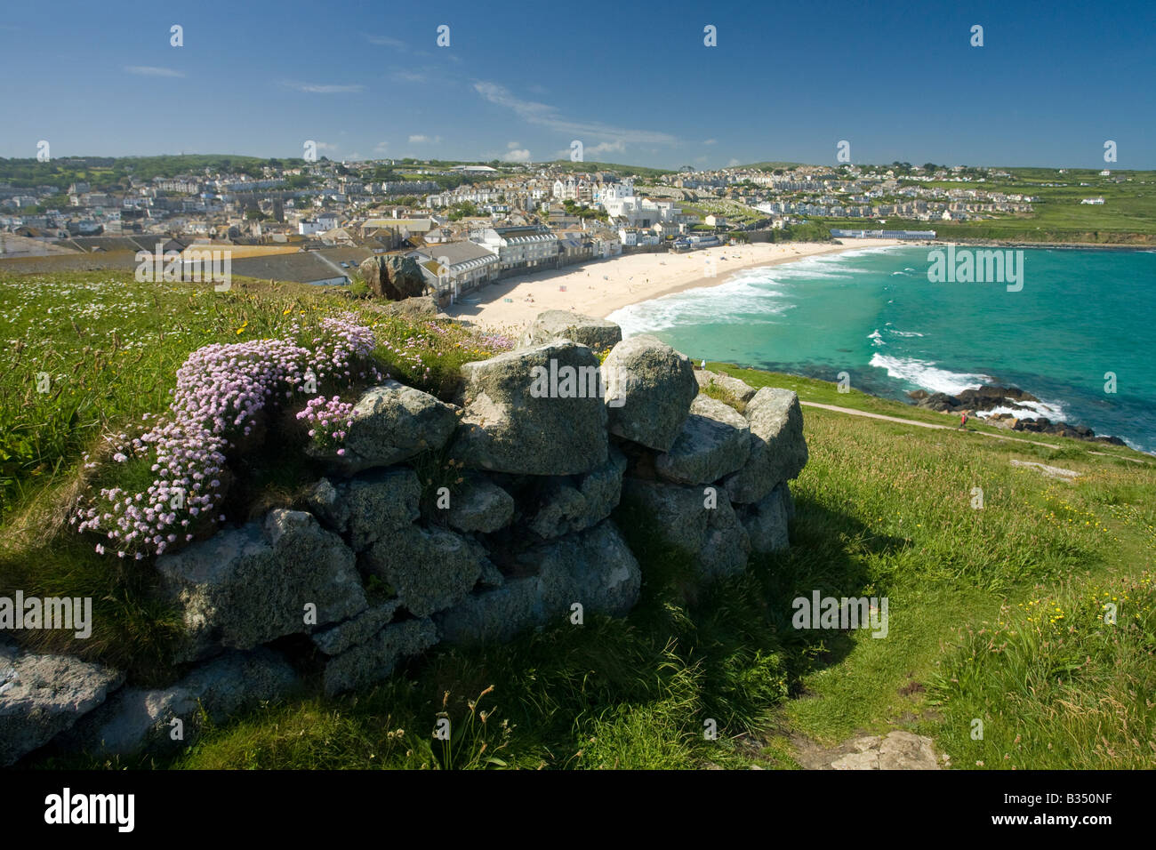 Porthmoer Beach from the Island St Ives in summer sunshine Cornwall West Country England UK United Kingdom GB Great Britain Stock Photo