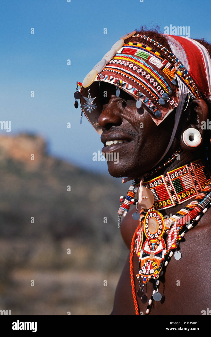 Kenya, Samburu. Elaborate headdress and body adornments worn by Samburu moran (warrior). Stock Photo