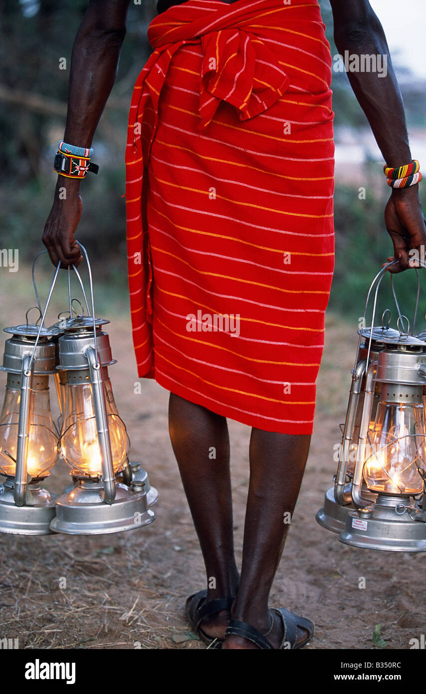 Kenya, Samburu. Service in the bush kerosene lanterns light the