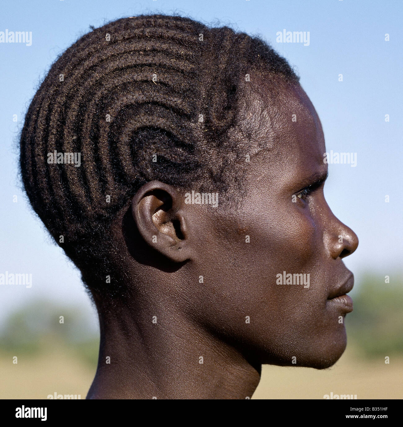 Kenya, Turkana, Oropoi. A young Turkana man with a braided hairstyle Stock  Photo - Alamy