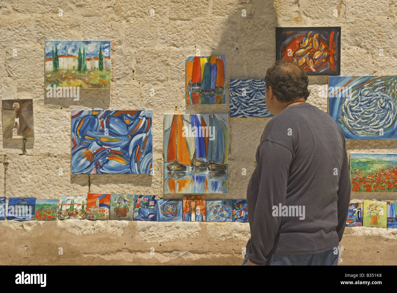 Modern paintings displayed in Split's Old Town Stock Photo