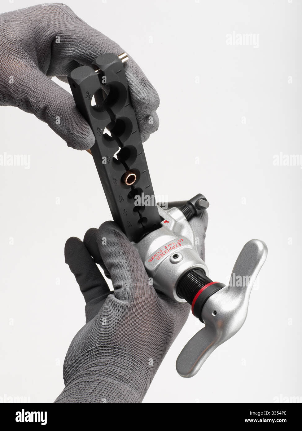 PLUMBER OPERATING AN ECCENTRIC COPPER PIPE FLARING TOOL Stock Photo Alamy