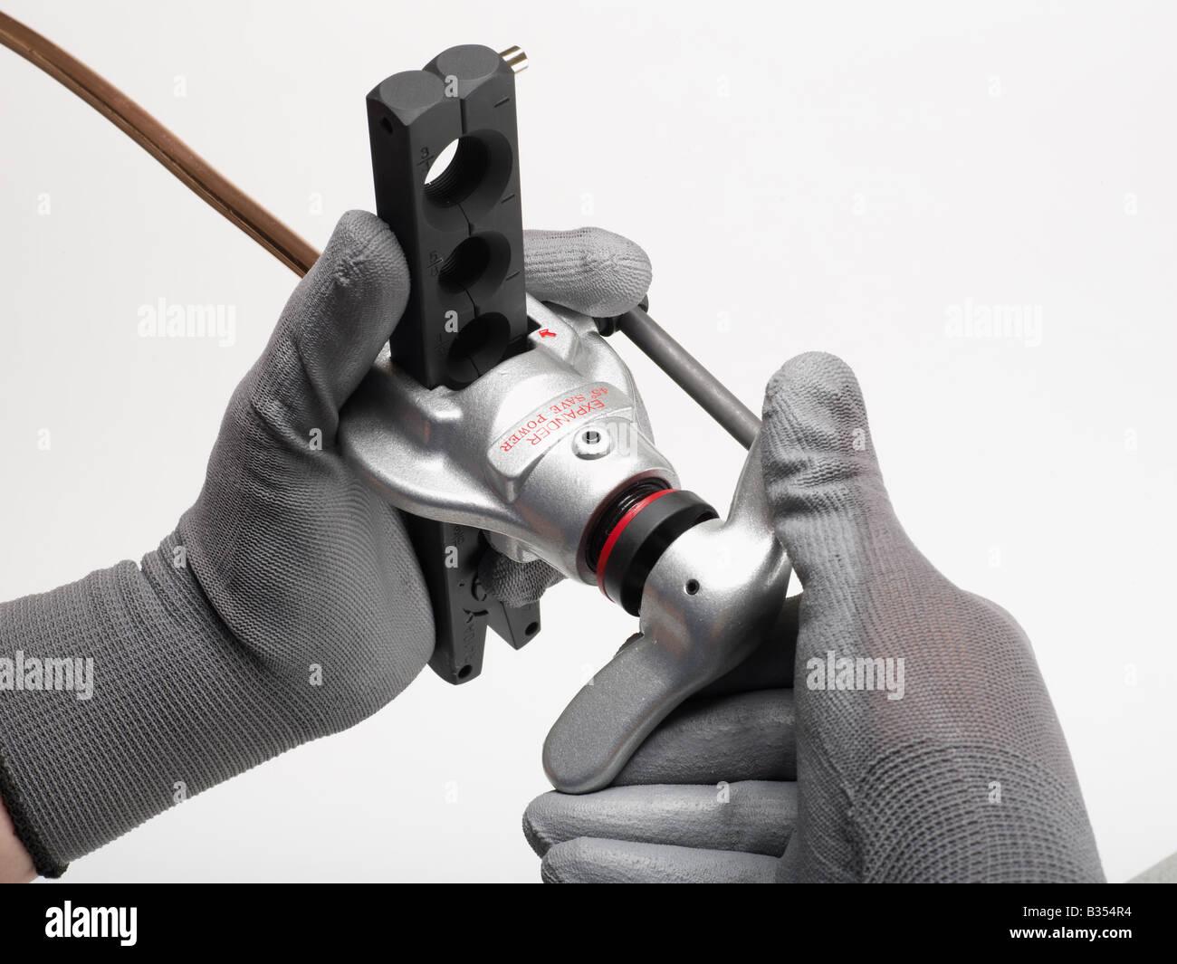 PLUMBER OPERATING AN ECCENTRIC COPPER PIPE FLARING TOOL Stock Photo Alamy