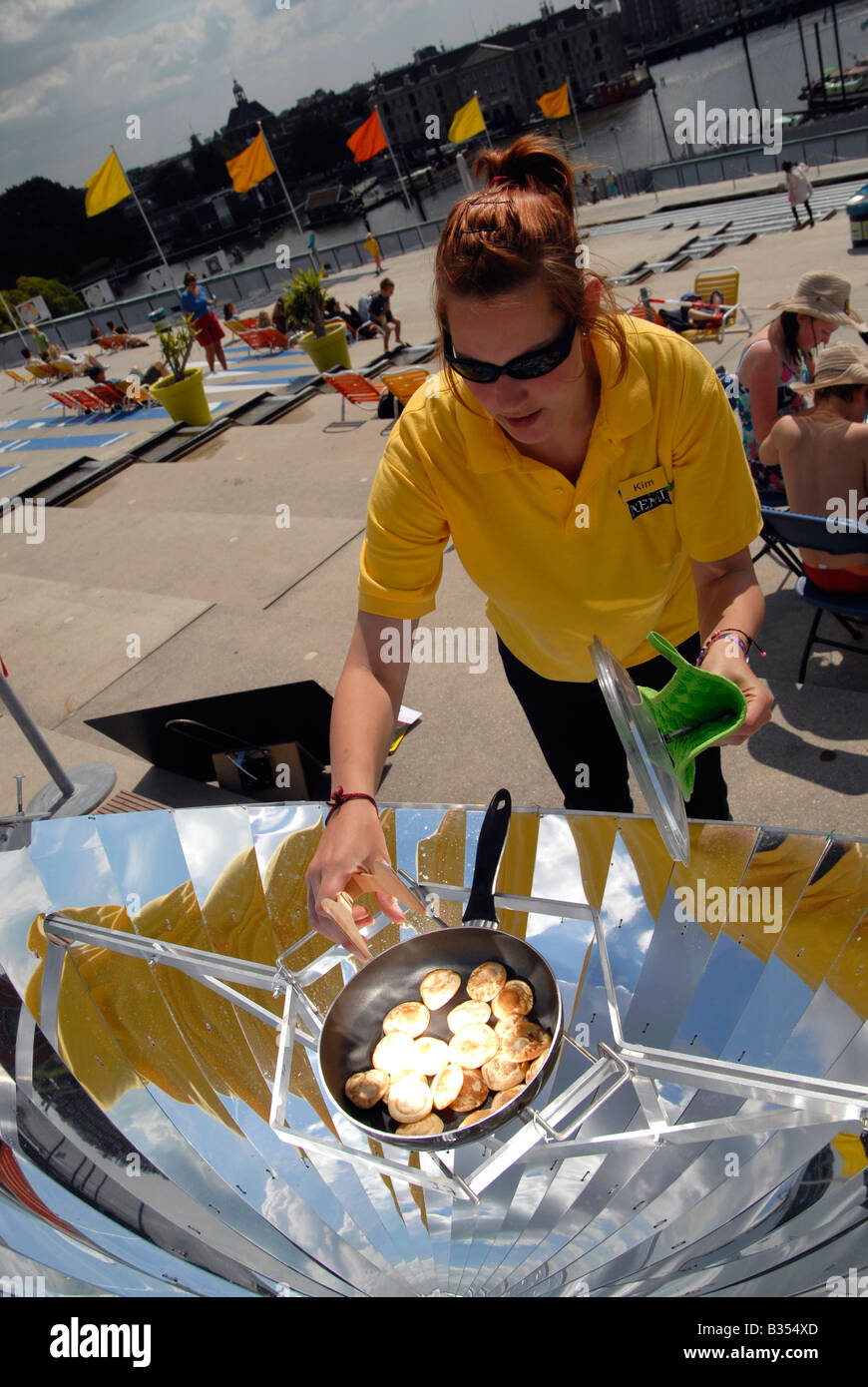 A parabolic solar oven being demonstrated on the roof of the Nemo science centre in Amsterdam, Holland Stock Photo