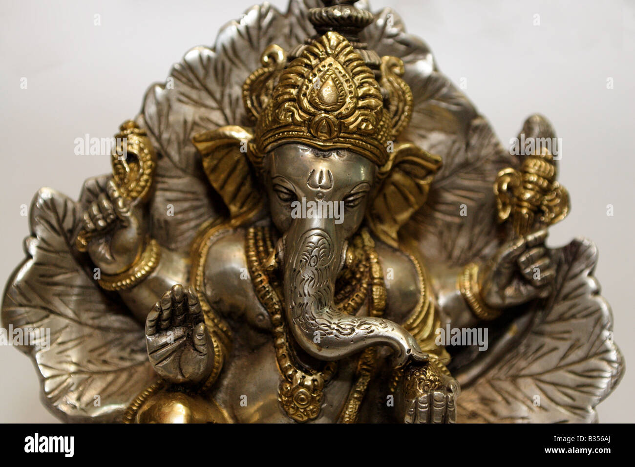 A silver and copper Ganesha statue. Stock Photo