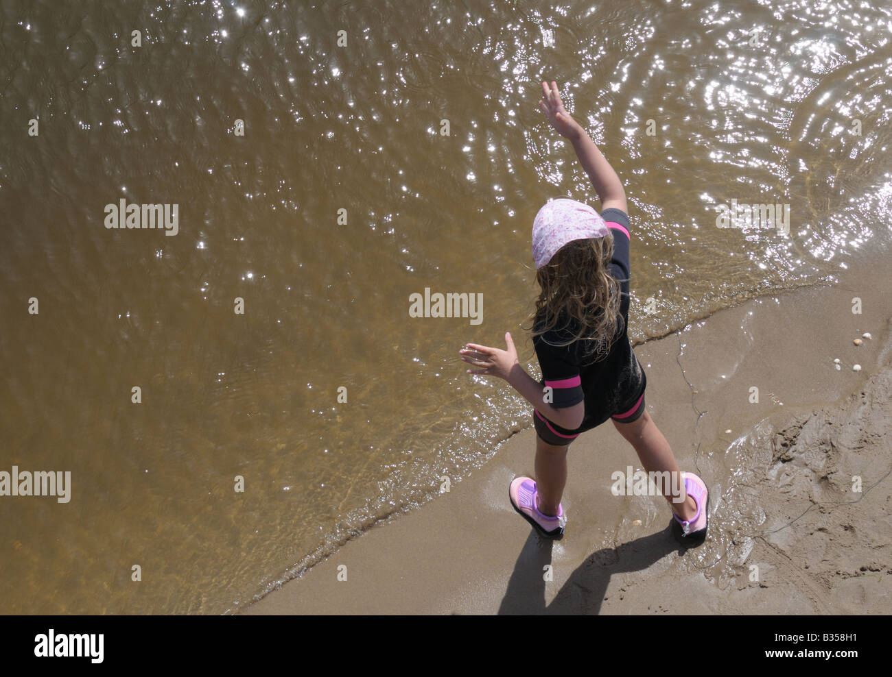 Crab fishing on the beach shoreline Stock Photo Alamy