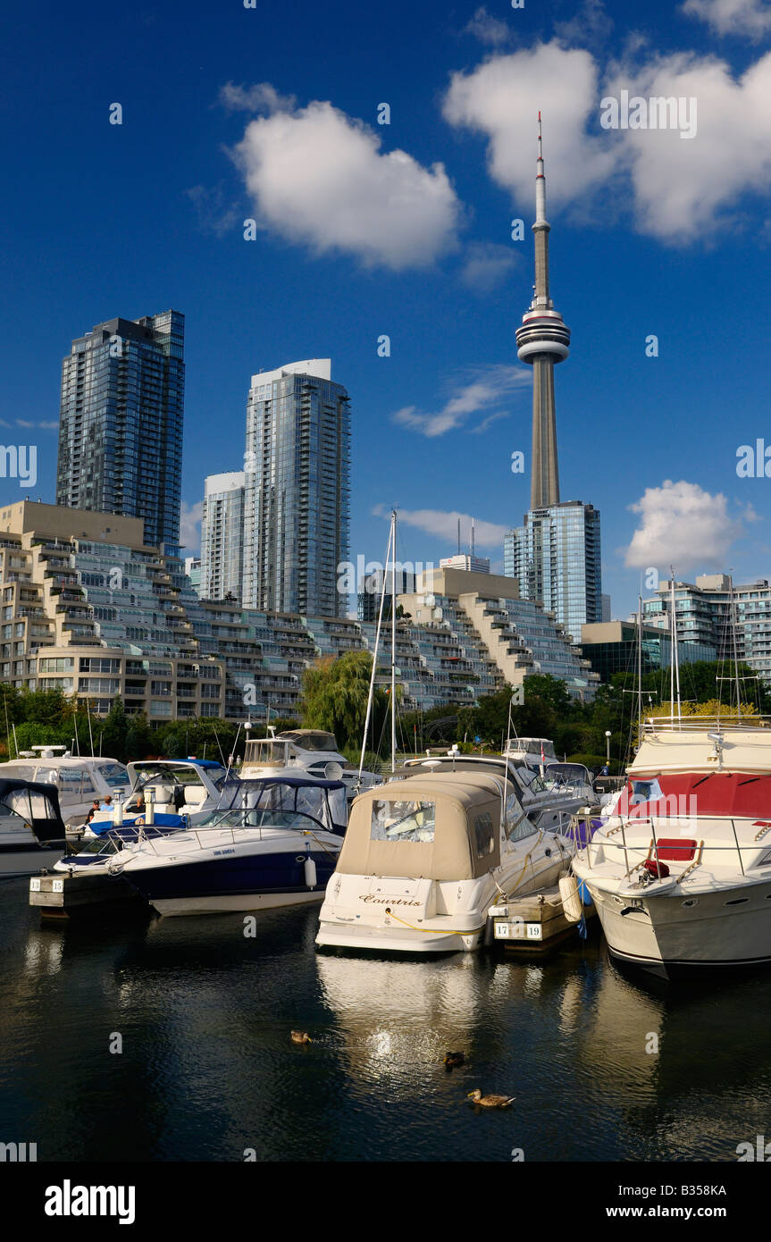 Toronto harborfront condos and marina at Musical Garden Spadina Quay on Lake Ontario with CN Tower Stock Photo