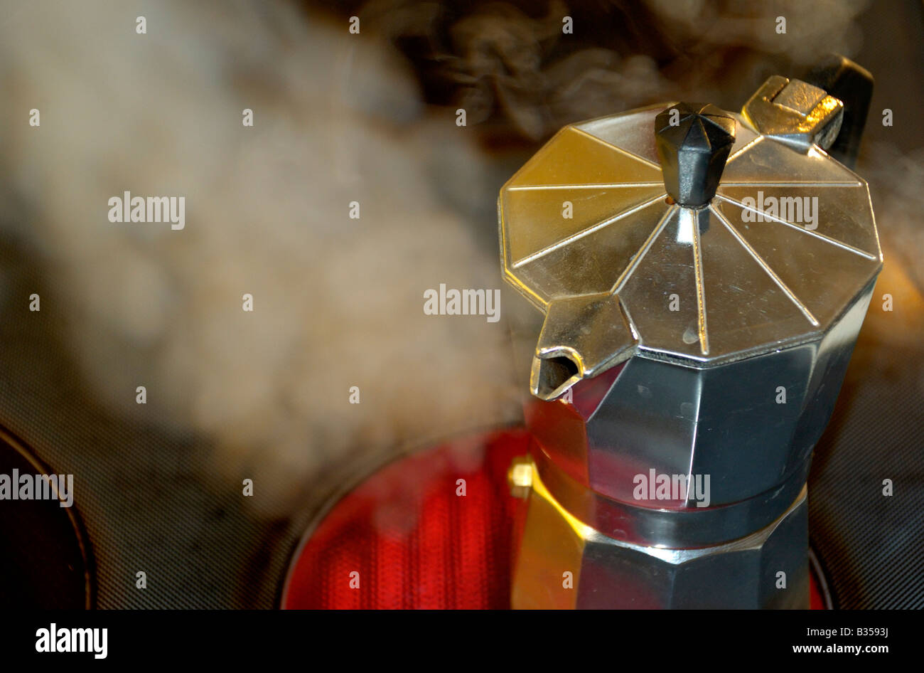 Stovetop moka espresso maker producing steam Stock Photo Alamy