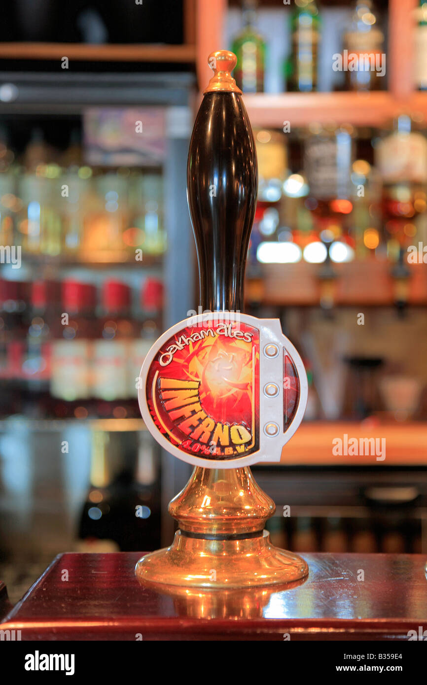 Beer Pump of Inferno Ale from Oakham Ales Brewery in a pub bar setting real ale Stock Photo
