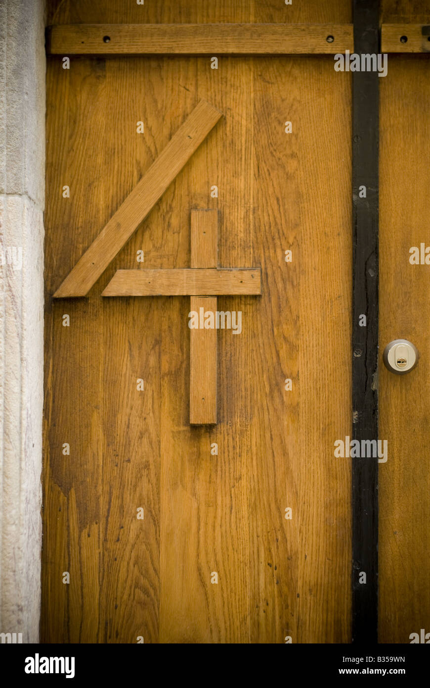 The number 4 (four) on a wooden door in Gamla Stan, Stockholm's historic Old Town, Sweden. Stock Photo