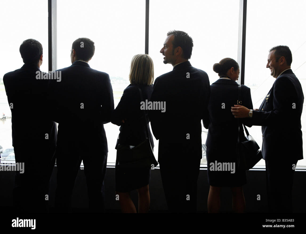 A flight crew waiting to board a flight at Logan International Airport, Boston, Massachusetts Stock Photo