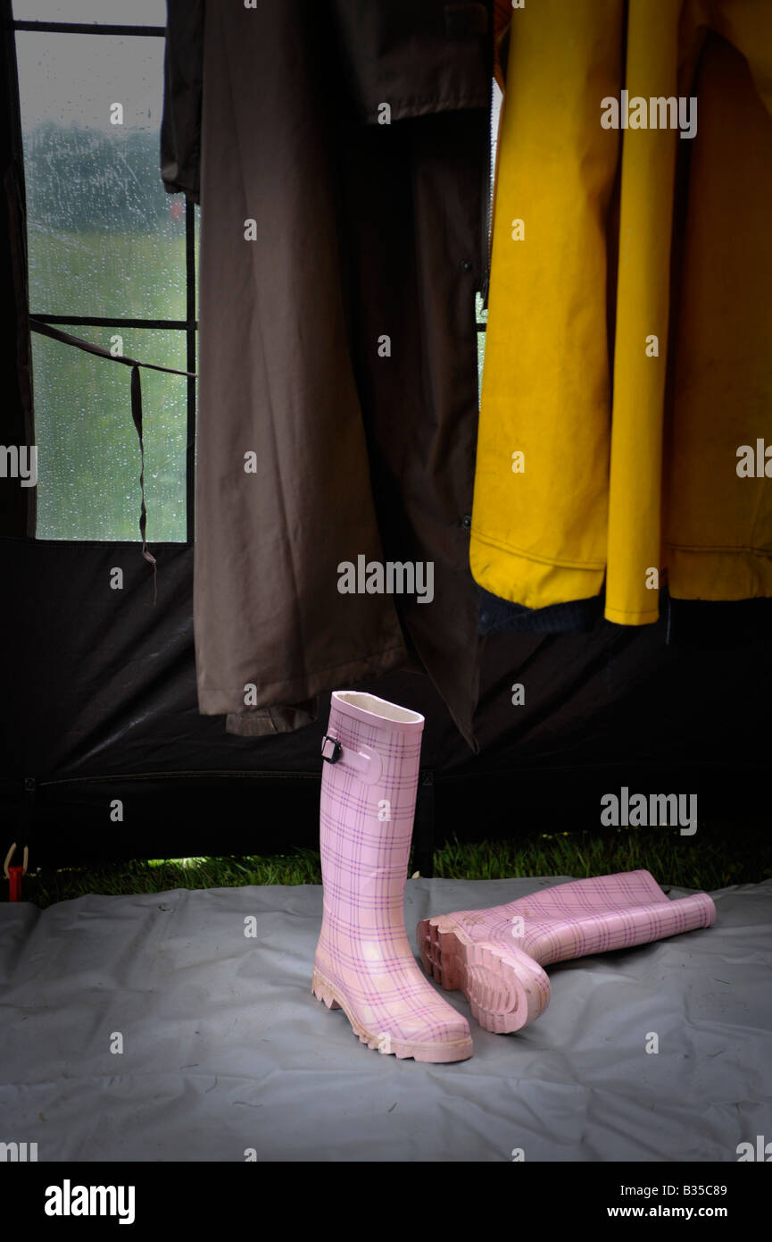 Raincoats boots hires stock photography and images Alamy