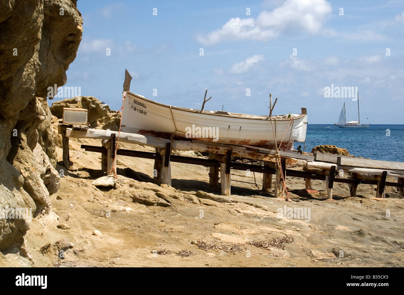 Fishing boat and yacht, Pou des Lleo, Ibiza Stock Photo