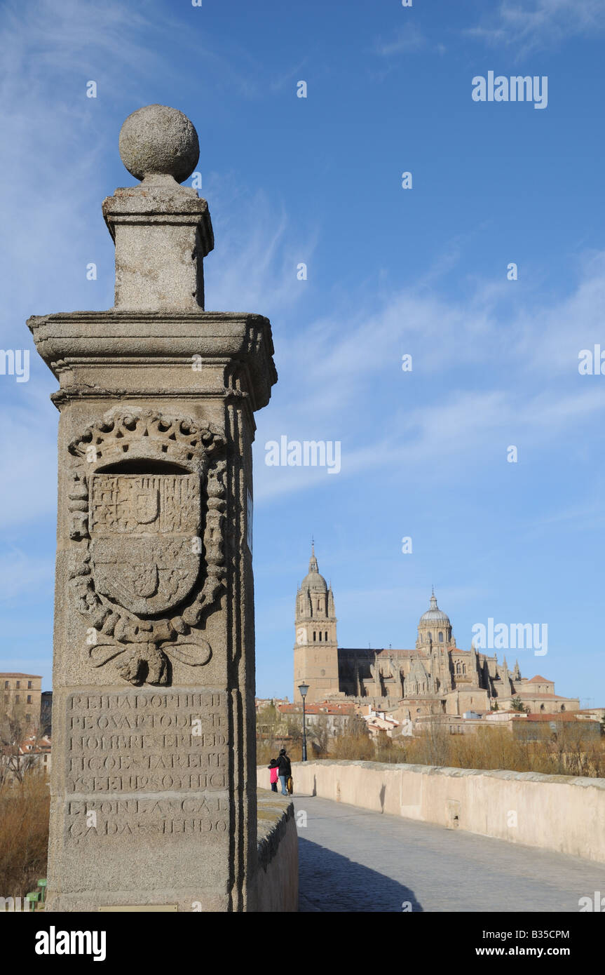 Stone pillar monument at the end of the Roman Bridge Puente Romano Salamanca Spain Stock Photo