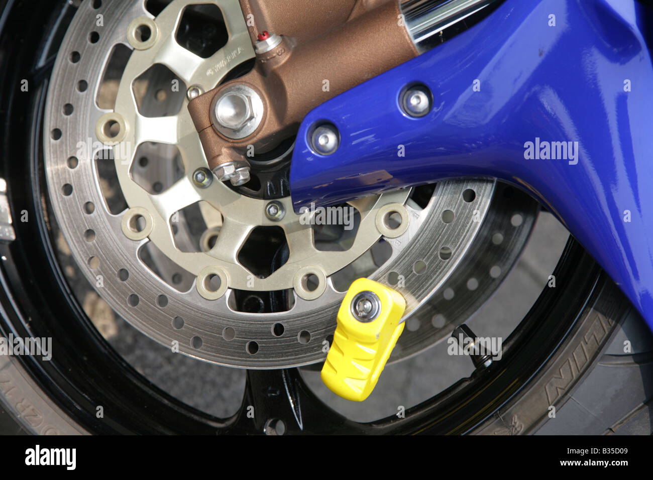 motorbike front wheel disc brake lock Stock Photo Alamy