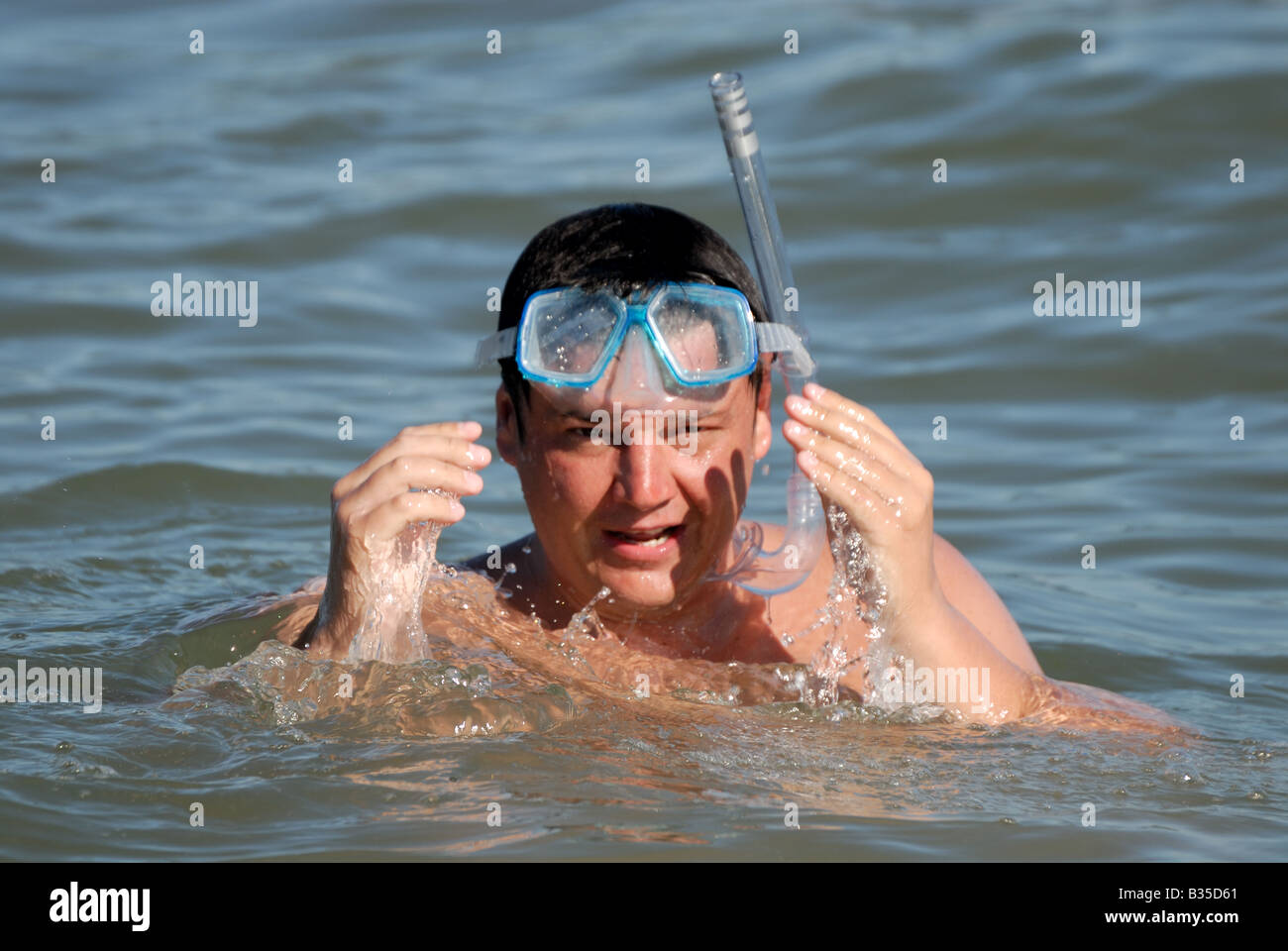 Man snorkeling in the sea Stock Photo