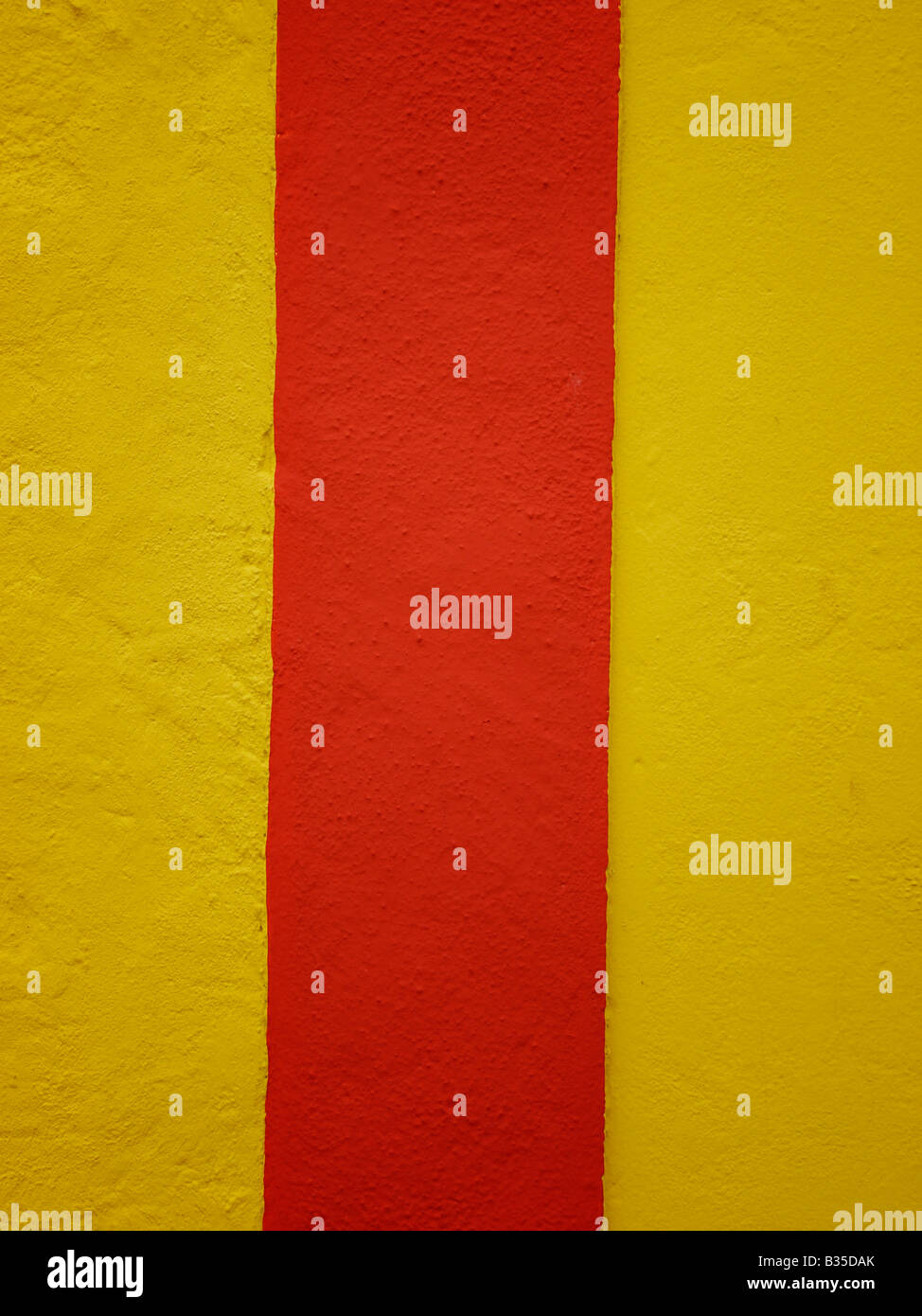 Red vertical stripe yellow background Stock Photo - Alamy