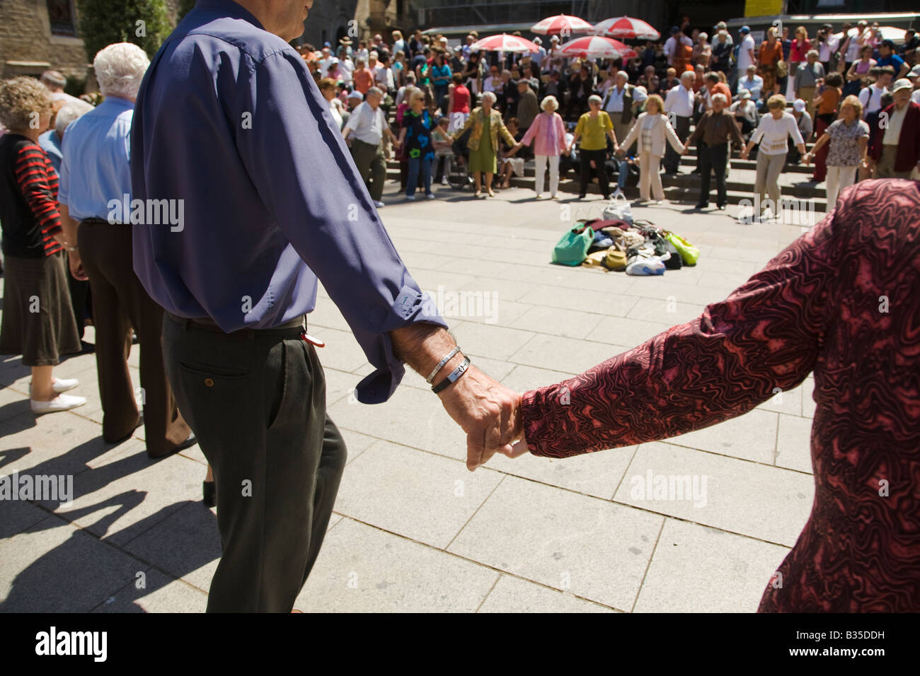 SPAIN Barcelona Sardana dance in Cathedral plaza traditional Catalan folk dance cobla band plays music belongings in center Stock Photo