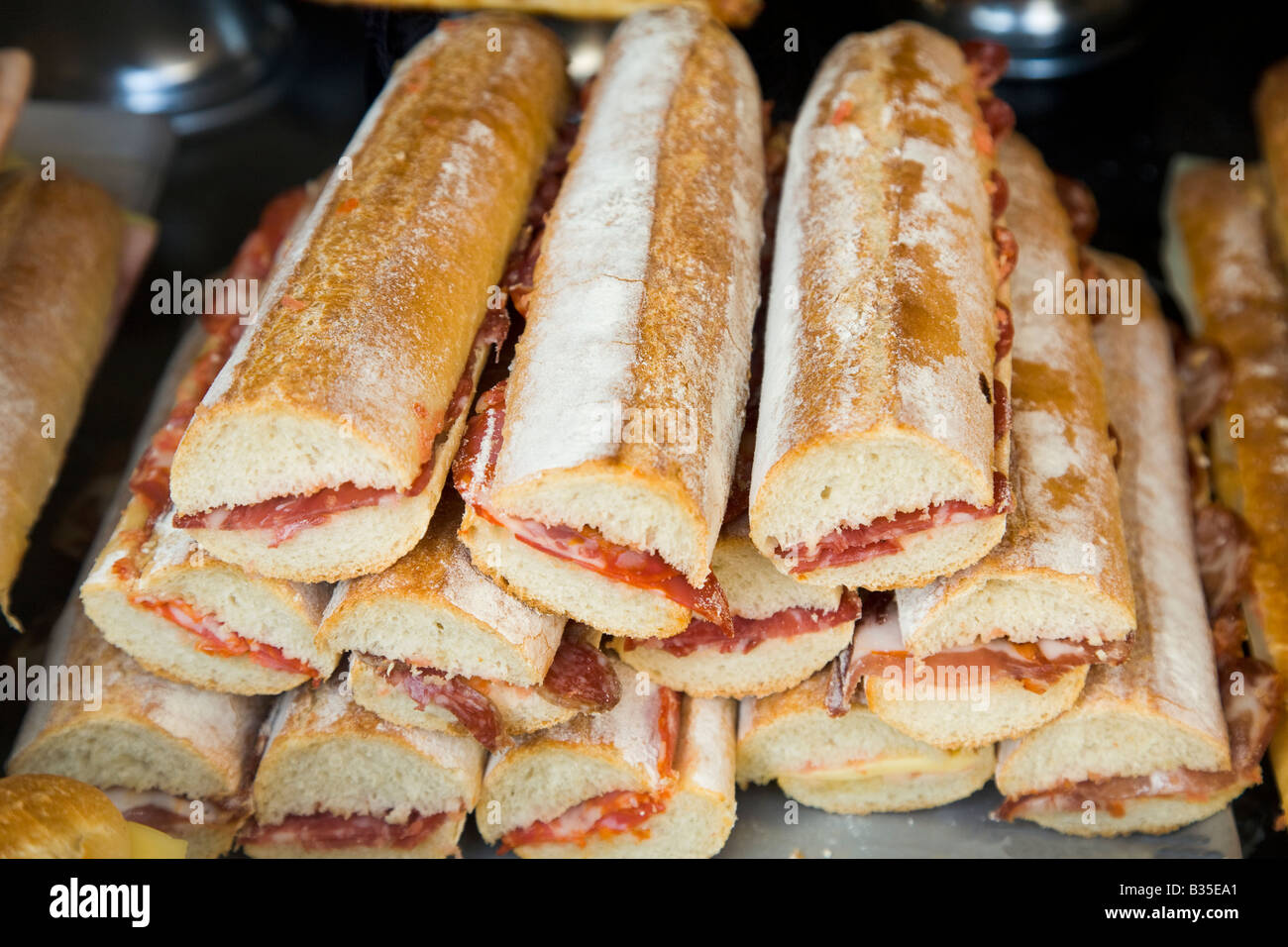 SPAIN Barcelona Ham on bread sandwiches displayed in store bocadillo with jamon traditional Spanish food Stock Photo